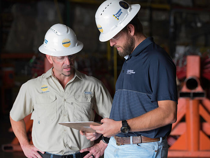 Two employees talking